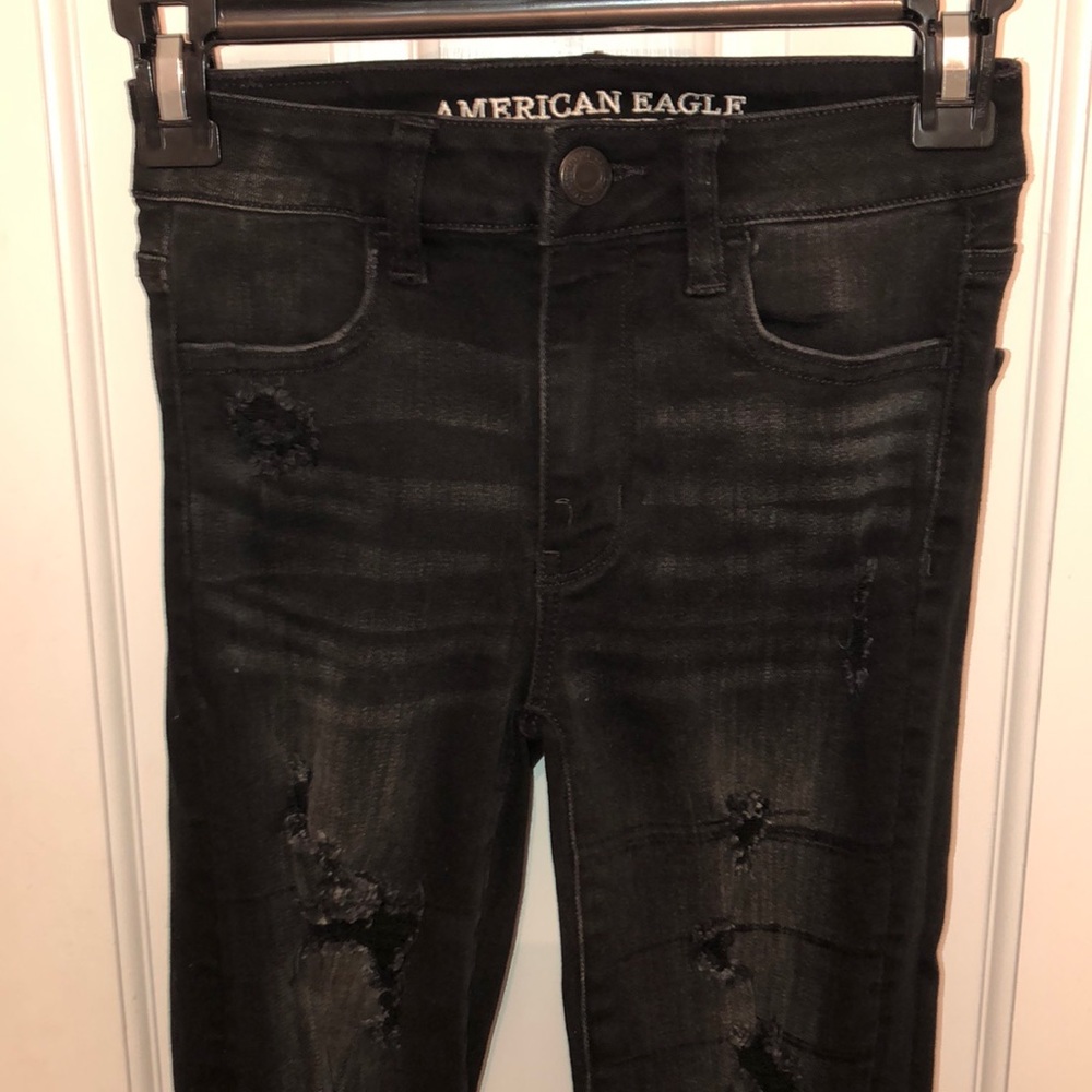 Ripped black skinny jeans